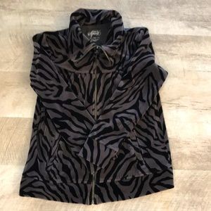 Women’s warm up jacket. Animal print, black and dark gray. Size petite small.